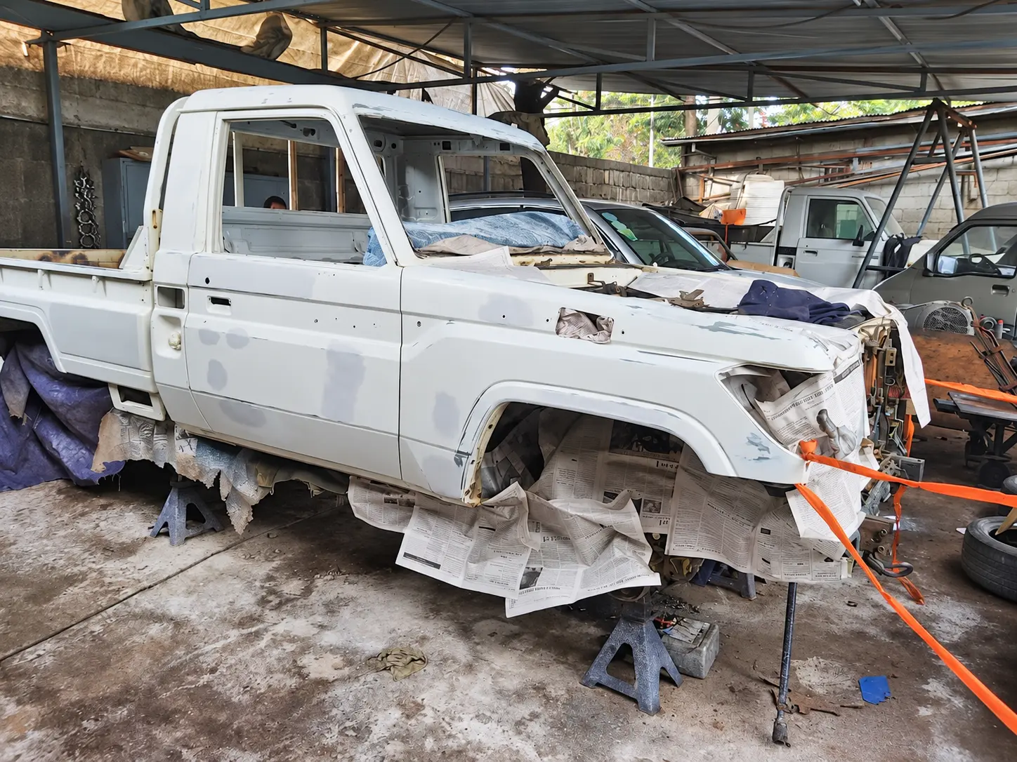 Pickup body prepared for paint — photo from the Felege Garage workshop